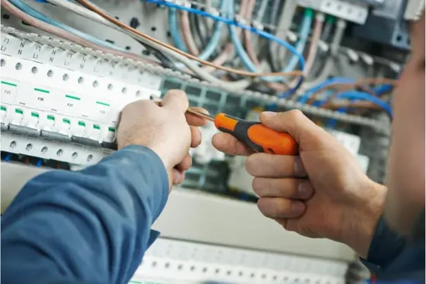close up of an electrical test to show the importance of businesses having them.